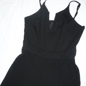 BLACK PLUNGING JUMPSUIT